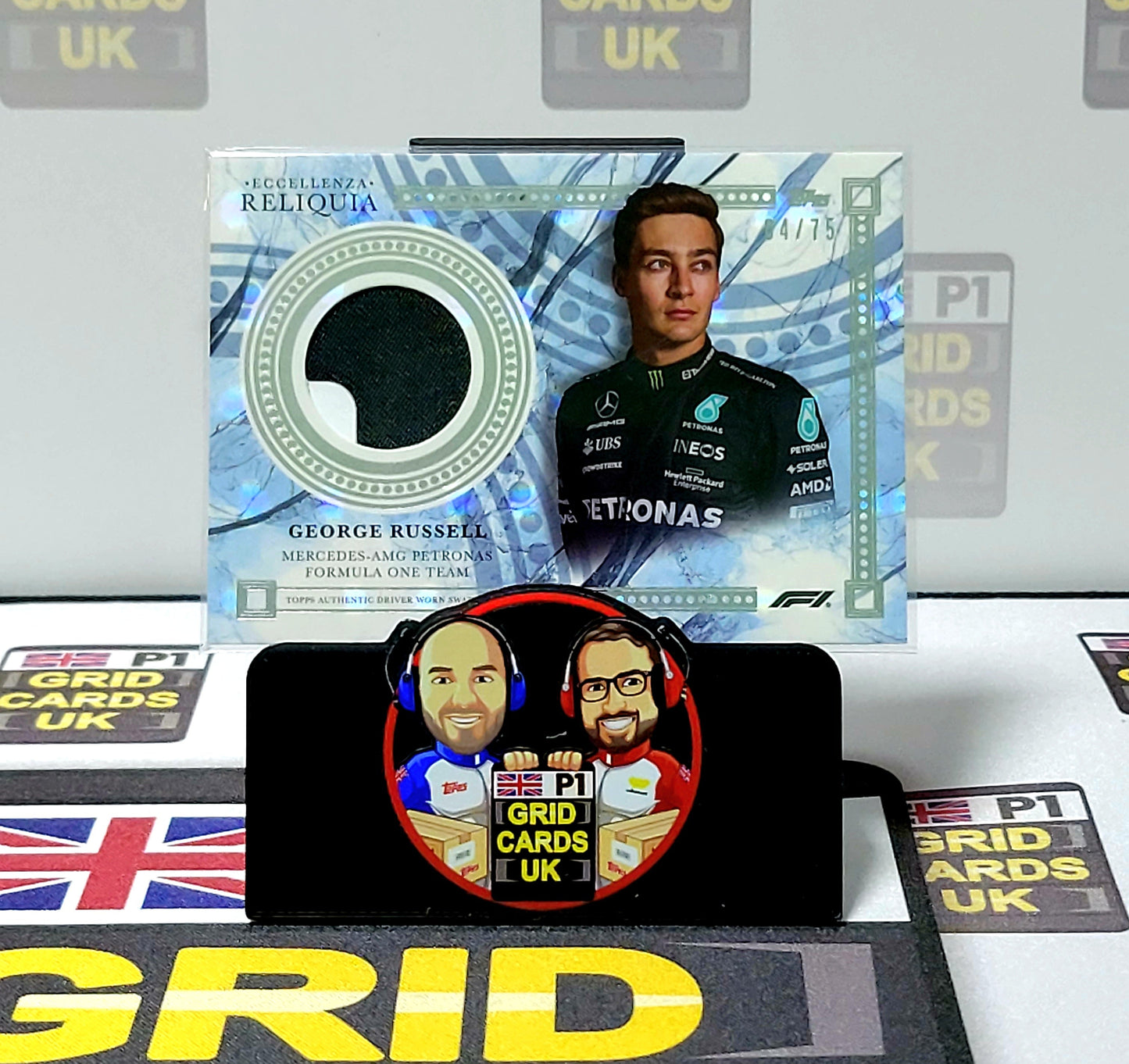 George Russell 64/75 Grey Relic Reliquia - Topps Eccellenza F1 2023