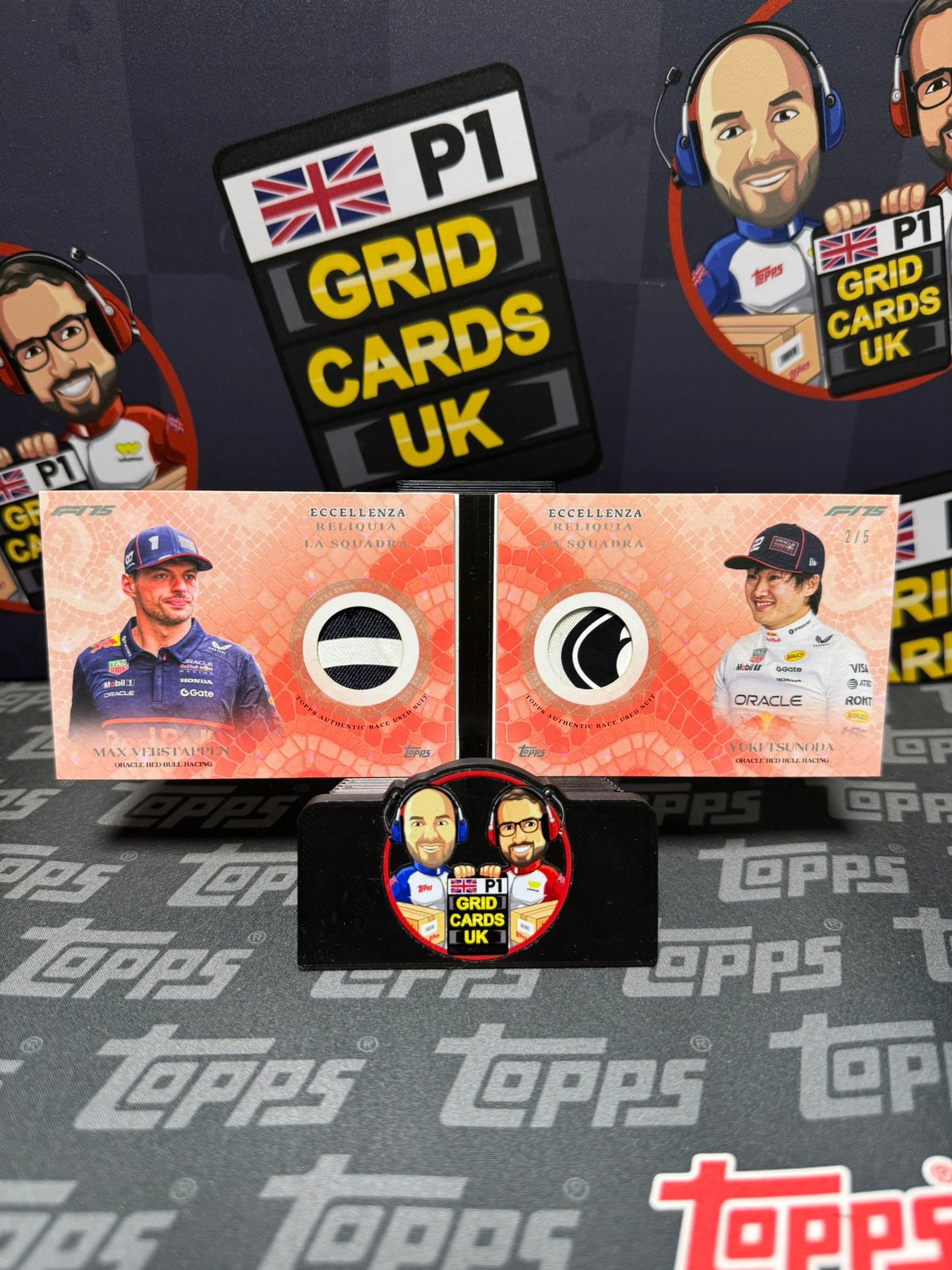 RedBull Dual Booklet Relic Max Verstappen / Yuki RED 2/5 - Topps F1 Eccellenza 2025